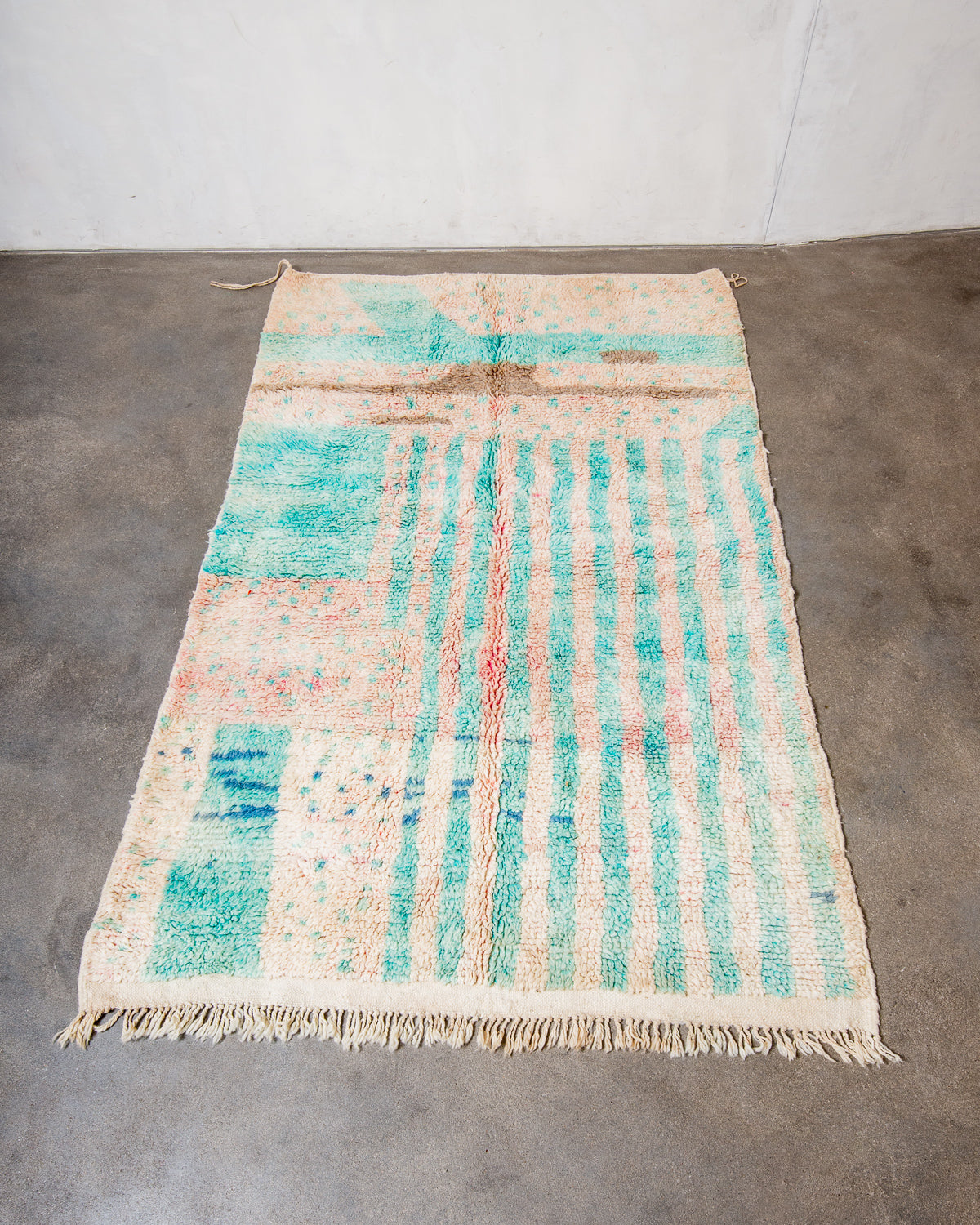 Modern, designer, handcrafted Berber rug from Morocco. Vintage carpet with beautiful colours and patterns and fluffy texture.